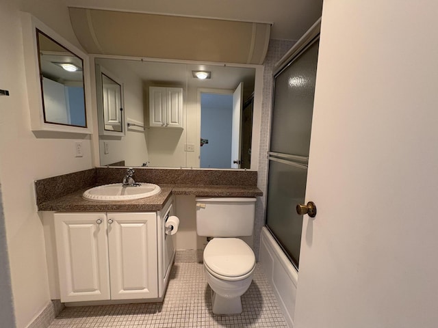 353 Mansfield I Unit 353I, Boca Raton, FL 33434 - bathroom with vanity, tile patterned flooring, and enclosed tub / shower combo