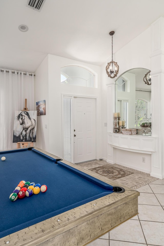 1513 SE Holyrood Ln, Port Saint Lucie, FL 34952 - playroom featuring a chandelier, light tile patterned flooring, arched walkways, and pool table