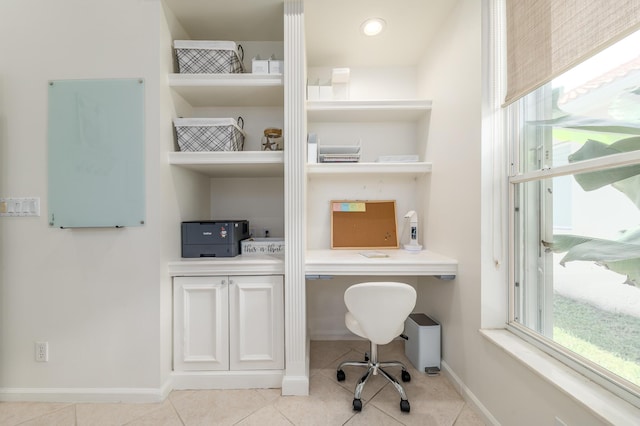 1513 SE Holyrood Ln, Port Saint Lucie, FL 34952 - home office with healthy amount of natural light and light tile patterned floors