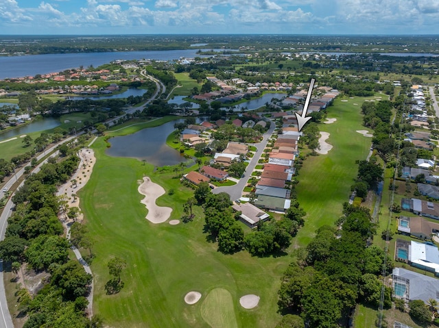 1513 SE Holyrood Ln, Port Saint Lucie, FL 34952 - aerial view of property and surrounding area with nearby suburban area and a local golf course