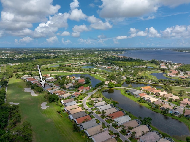 1513 SE Holyrood Ln, Port Saint Lucie, FL 34952 - aerial view of residential area featuring a nearby body of water and a golf club