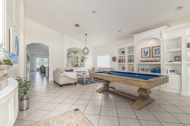 1513 SE Holyrood Ln, Port Saint Lucie, FL 34952 - recreation room featuring arched walkways, light tile patterned floors, vaulted ceiling, billiards table, and built in features