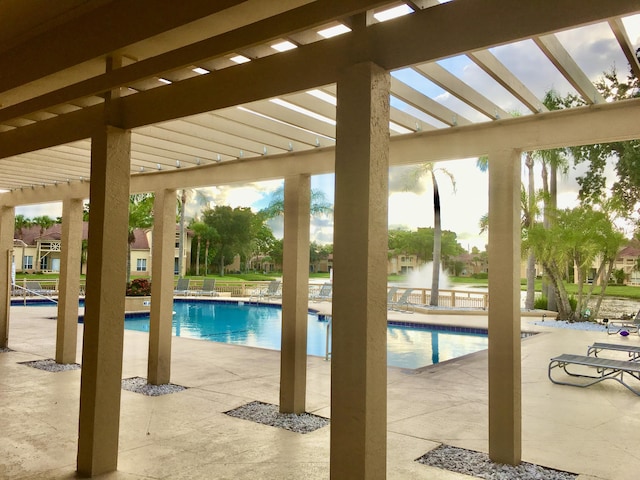 4855 Via Palm Lks Unit 904, West Palm Beach, FL 33417 - community pool featuring a patio