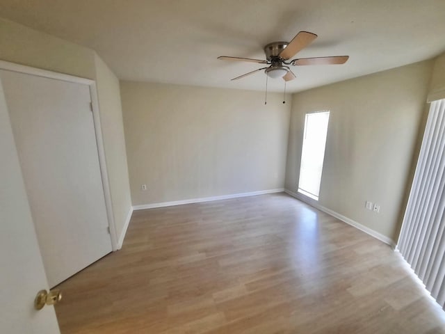 4855 Via Palm Lks Unit 904, West Palm Beach, FL 33417 - spare room featuring ceiling fan and light wood-style floors