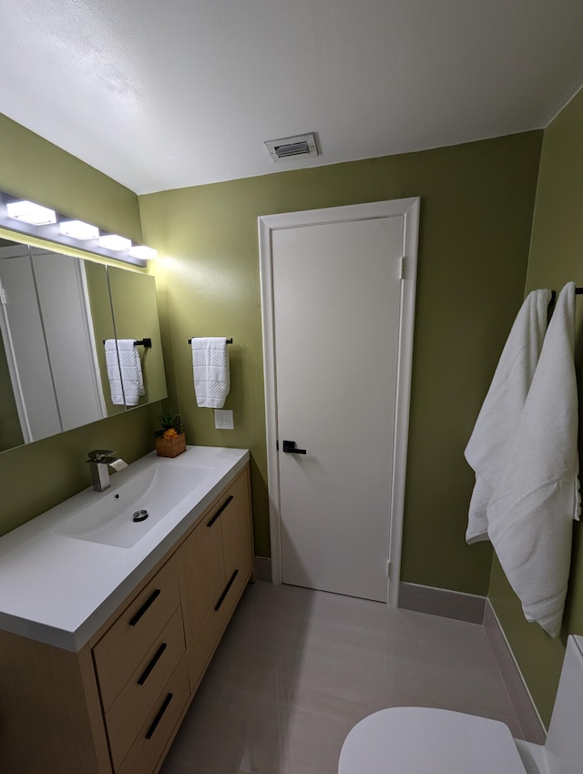 2904 N 35th Ter, Hollywood, FL 33021 - bathroom featuring vanity and baseboards