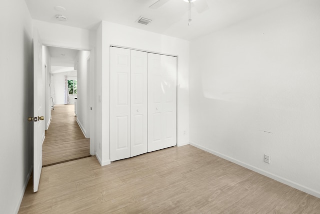 5711 NW 125th Ave, Coral Springs, FL 33076 - unfurnished bedroom featuring light wood-type flooring, a closet, and a ceiling fan