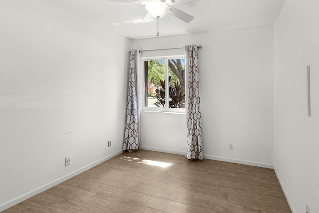 5711 NW 125th Ave, Coral Springs, FL 33076 - spare room with a ceiling fan and wood finished floors