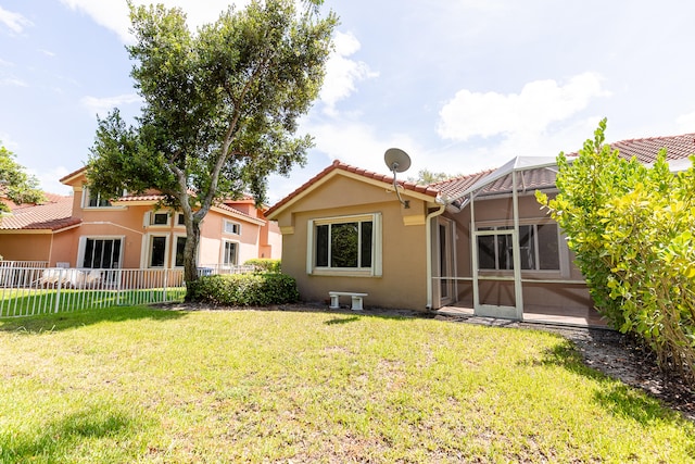 5711 NW 125th Ave, Coral Springs, FL 33076 - back of property with stucco siding and a tiled roof