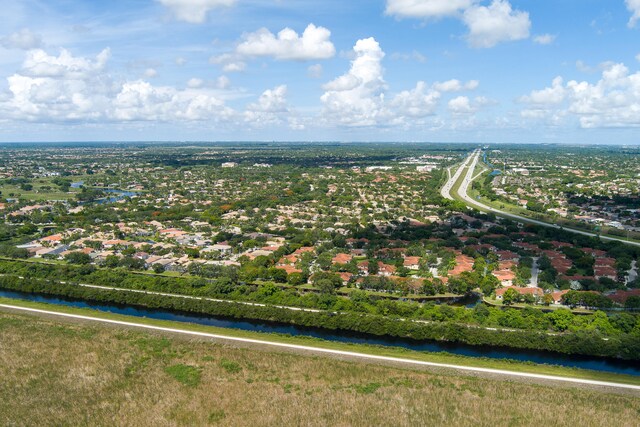 5711 NW 125th Ave, Coral Springs, FL 33076 - aerial view of residential area featuring a large body of water