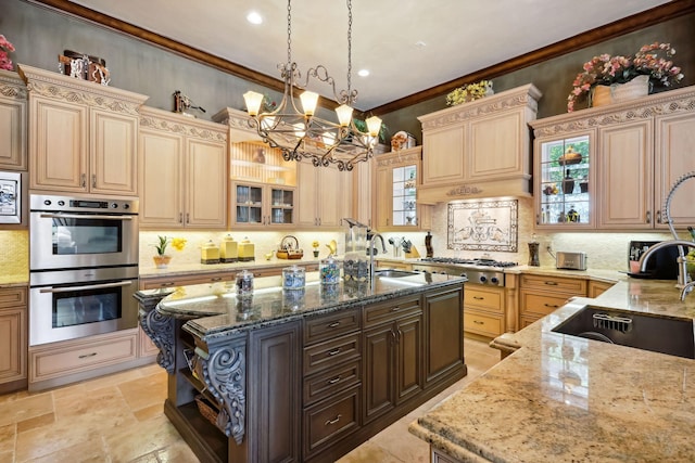 3870 NE 31st Ave, Lighthouse Point, FL 33064 - kitchen with appliances with stainless steel finishes, a chandelier, light stone counters, decorative backsplash, and ornamental molding