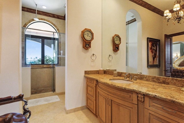 3870 NE 31st Ave, Lighthouse Point, FL 33064 - full bathroom featuring a stall shower, vanity, and a chandelier