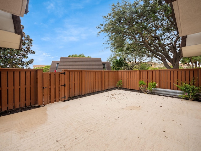 2005 20th Ct, Jupiter, FL 33477 - fenced yard with a gate and a patio