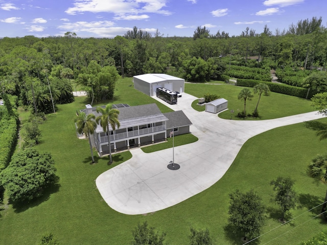 2511 F Rd, Loxahatchee Groves, FL 33470 - aerial view of property and surrounding area with a forest