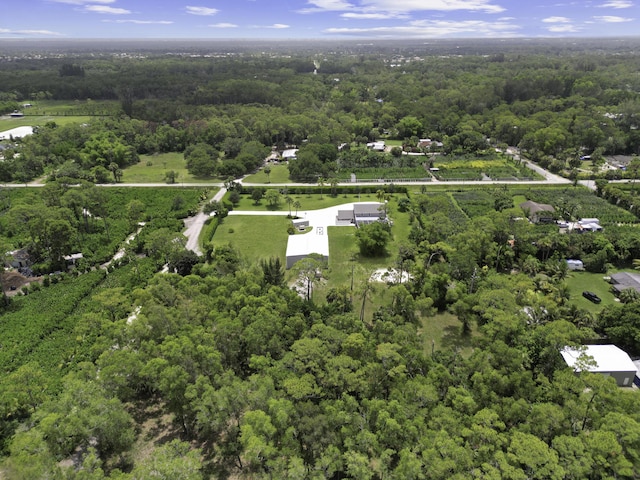 2511 F Rd, Loxahatchee Groves, FL 33470 - aerial view of property and surrounding area with a forest