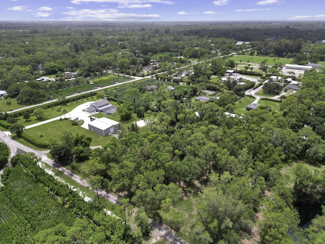 2511 F Rd, Loxahatchee Groves, FL 33470 - aerial overview of property's location featuring a heavily wooded area