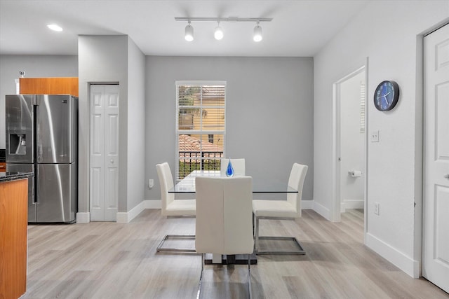2536 SW 14th Ave Unit 1102, Fort Lauderdale, FL 33315 - dining room featuring light wood-style floors