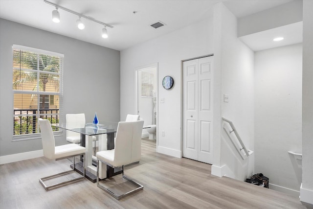 2536 SW 14th Ave Unit 1102, Fort Lauderdale, FL 33315 - dining room with wood finished floors and track lighting