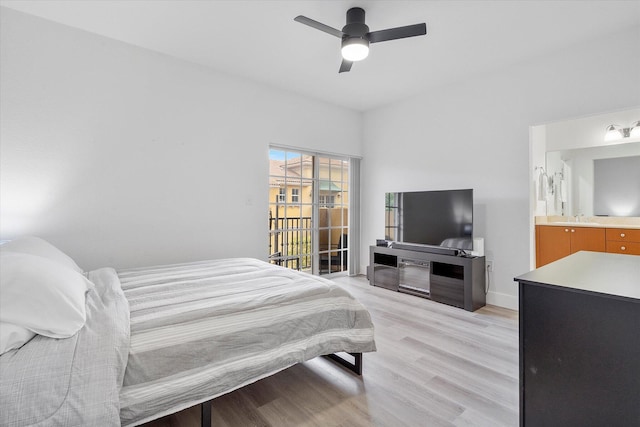 2536 SW 14th Ave Unit 1102, Fort Lauderdale, FL 33315 - bedroom featuring light wood-style flooring, ceiling fan, and connected bathroom