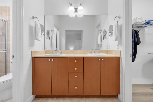 2536 SW 14th Ave Unit 1102, Fort Lauderdale, FL 33315 - full bath with a shower stall, double vanity, and a walk in closet