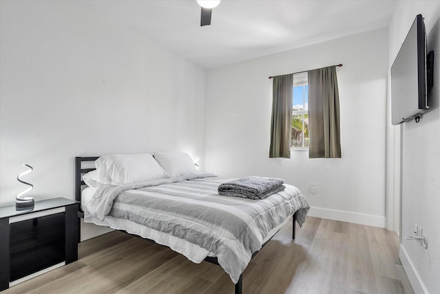 2536 SW 14th Ave Unit 1102, Fort Lauderdale, FL 33315 - bedroom with light wood finished floors and a ceiling fan