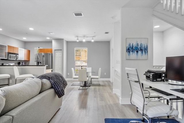 2536 SW 14th Ave Unit 1102, Fort Lauderdale, FL 33315 - living room with light wood-style flooring and recessed lighting