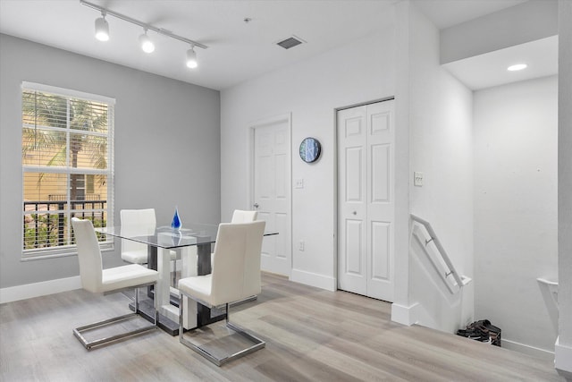 2536 SW 14th Ave Unit 1102, Fort Lauderdale, FL 33315 - dining area with wood finished floors and baseboards