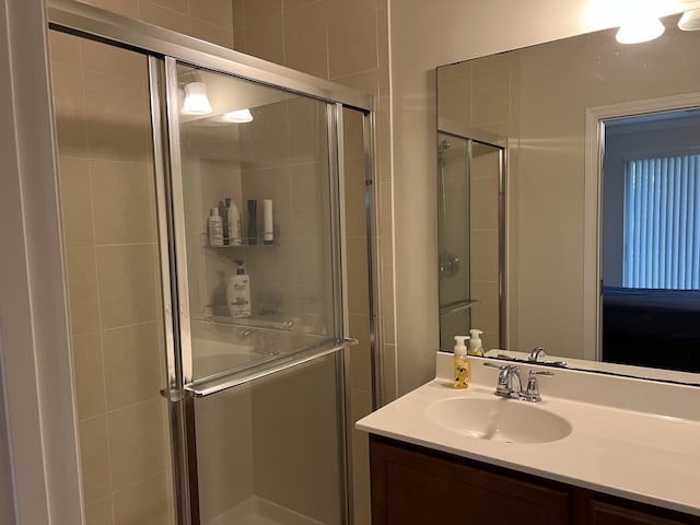 3303 E Mallory Blvd, Jupiter, FL 33458 - full bathroom with vanity and a stall shower