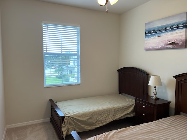 3303 E Mallory Blvd, Jupiter, FL 33458 - carpeted bedroom with baseboards