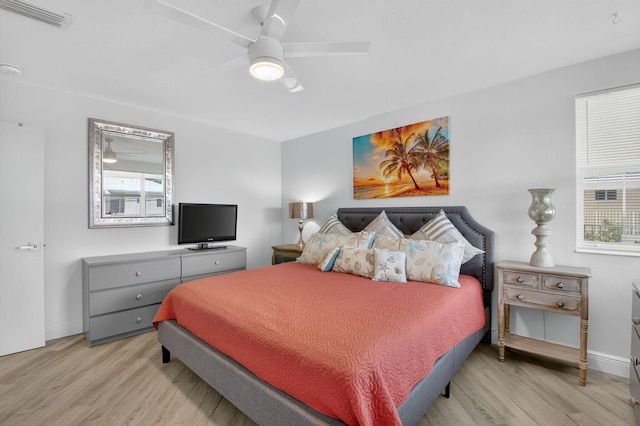 930 Osceola Dr Unit 8, Boca Raton, FL 33432 - bedroom featuring light wood-style floors, multiple windows, and ceiling fan