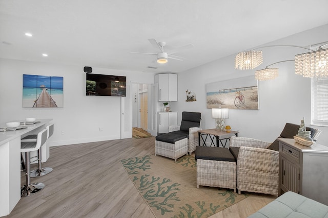 930 Osceola Dr Unit 8, Boca Raton, FL 33432 - living area with wood finished floors, a chandelier, ceiling fan, and recessed lighting
