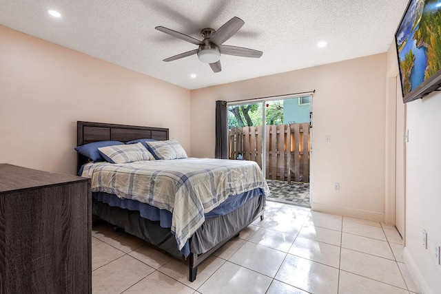 1530 Cypress Way Unit E, Palm Springs, FL 33406 - bedroom with access to outside, a ceiling fan, recessed lighting, light tile patterned floors, and a textured ceiling