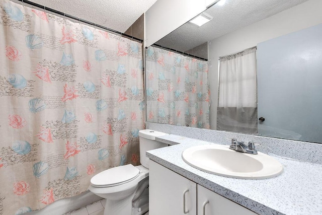 1530 Cypress Way Unit E, Palm Springs, FL 33406 - full bathroom featuring a textured ceiling, vanity, tile patterned floors, and a shower with curtain