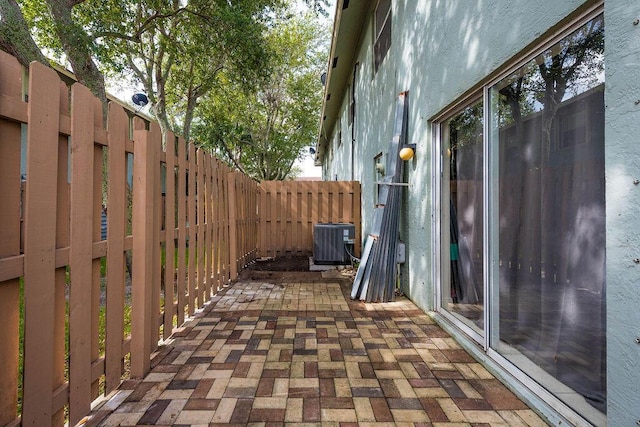 1530 Cypress Way Unit E, Palm Springs, FL 33406 - fenced backyard with a patio area