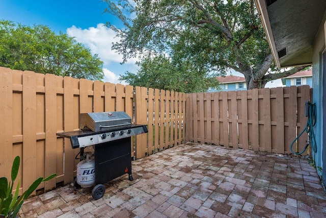 1530 Cypress Way Unit E, Palm Springs, FL 33406 - view of patio / terrace with grilling area