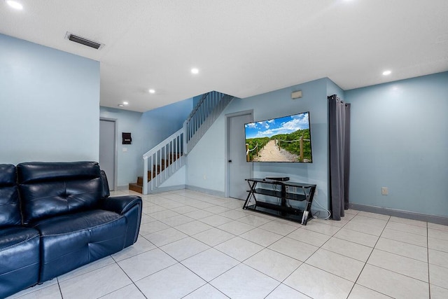 1530 Cypress Way Unit E, Palm Springs, FL 33406 - living area with stairs, light tile patterned floors, and recessed lighting