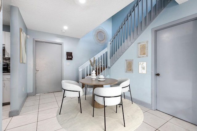1530 Cypress Way Unit E, Palm Springs, FL 33406 - dining room featuring stairs, light tile patterned flooring, and recessed lighting