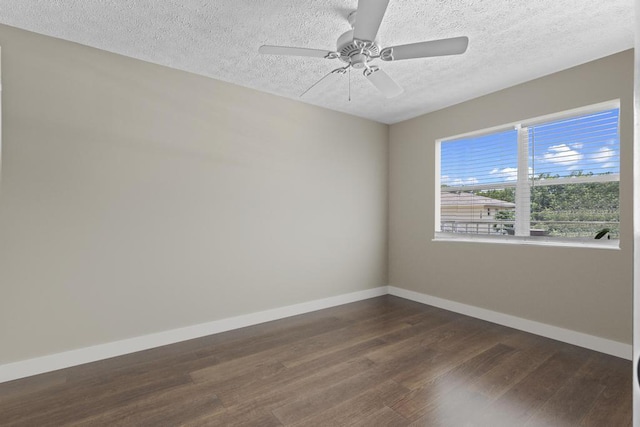 2950 SE Ocean Blvd Unit 119-6, Stuart, FL 34996 - unfurnished room with dark wood-style floors, a textured ceiling, and ceiling fan