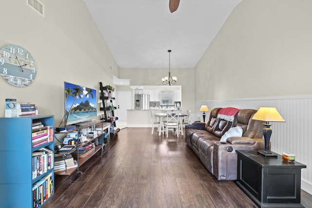 2950 SE Ocean Blvd Unit 119-6, Stuart, FL 34996 - living room featuring high vaulted ceiling, a chandelier, dark wood-type flooring, and ceiling fan