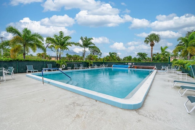 2950 SE Ocean Blvd Unit 119-6, Stuart, FL 34996 - community pool featuring a patio area