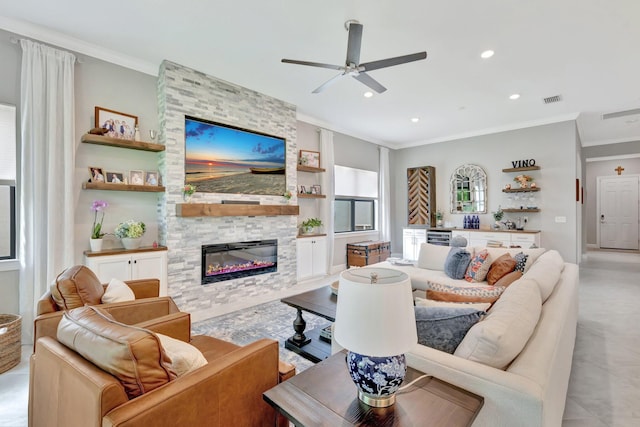 572 SE Villandry Way, Port Saint Lucie, FL 34984 - living area with ornamental molding, a ceiling fan, recessed lighting, a fireplace, and built in features