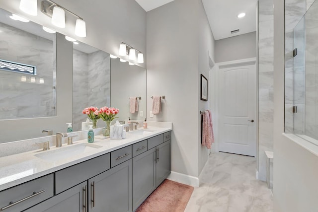 572 SE Villandry Way, Port Saint Lucie, FL 34984 - full bath featuring double vanity, marble finish flooring, an enclosed shower, and recessed lighting