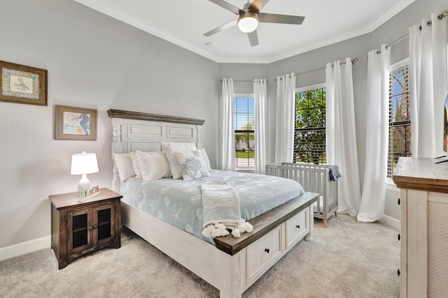 572 SE Villandry Way, Port Saint Lucie, FL 34984 - bedroom featuring light carpet, ornamental molding, and a ceiling fan
