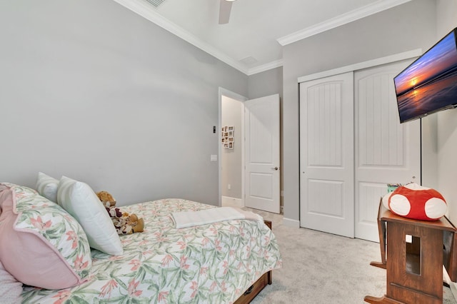 572 SE Villandry Way, Port Saint Lucie, FL 34984 - bedroom featuring carpet flooring, crown molding, a closet, and a ceiling fan