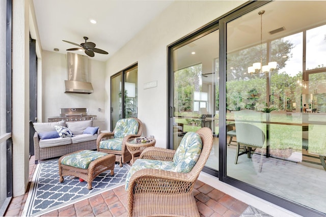 572 SE Villandry Way, Port Saint Lucie, FL 34984 - sunroom / solarium featuring exterior kitchen and a ceiling fan