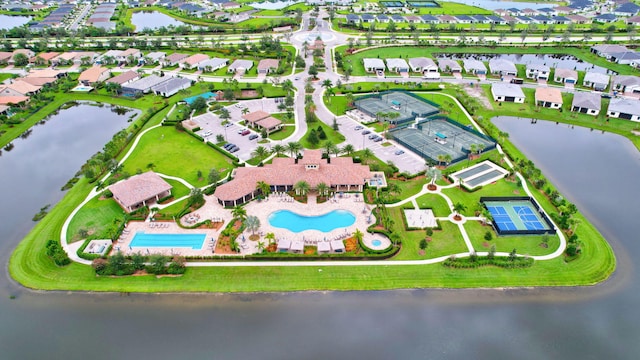 572 SE Villandry Way, Port Saint Lucie, FL 34984 - aerial perspective of suburban area with a large body of water