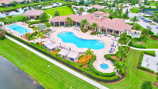 572 SE Villandry Way, Port Saint Lucie, FL 34984 - bird's eye view of a pool and a nearby body of water