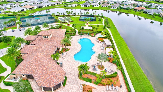 572 SE Villandry Way, Port Saint Lucie, FL 34984 - aerial view of residential area featuring a pool area and a nearby body of water