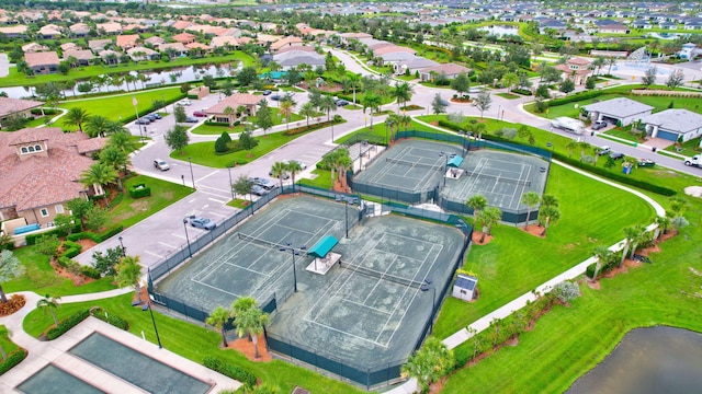 572 SE Villandry Way, Port Saint Lucie, FL 34984 - aerial perspective of suburban area with a large body of water