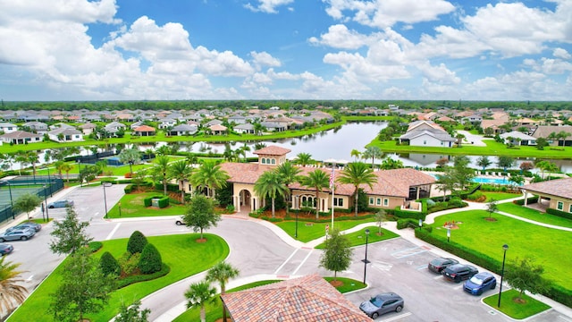 572 SE Villandry Way, Port Saint Lucie, FL 34984 - aerial perspective of suburban area featuring a nearby body of water