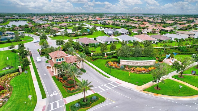 572 SE Villandry Way, Port Saint Lucie, FL 34984 - aerial perspective of suburban area featuring a large body of water